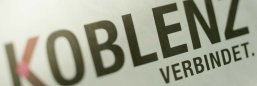 Logo Koblenz verbindet. angeschnittener Logoschriftzug "Koblenz verbindet."