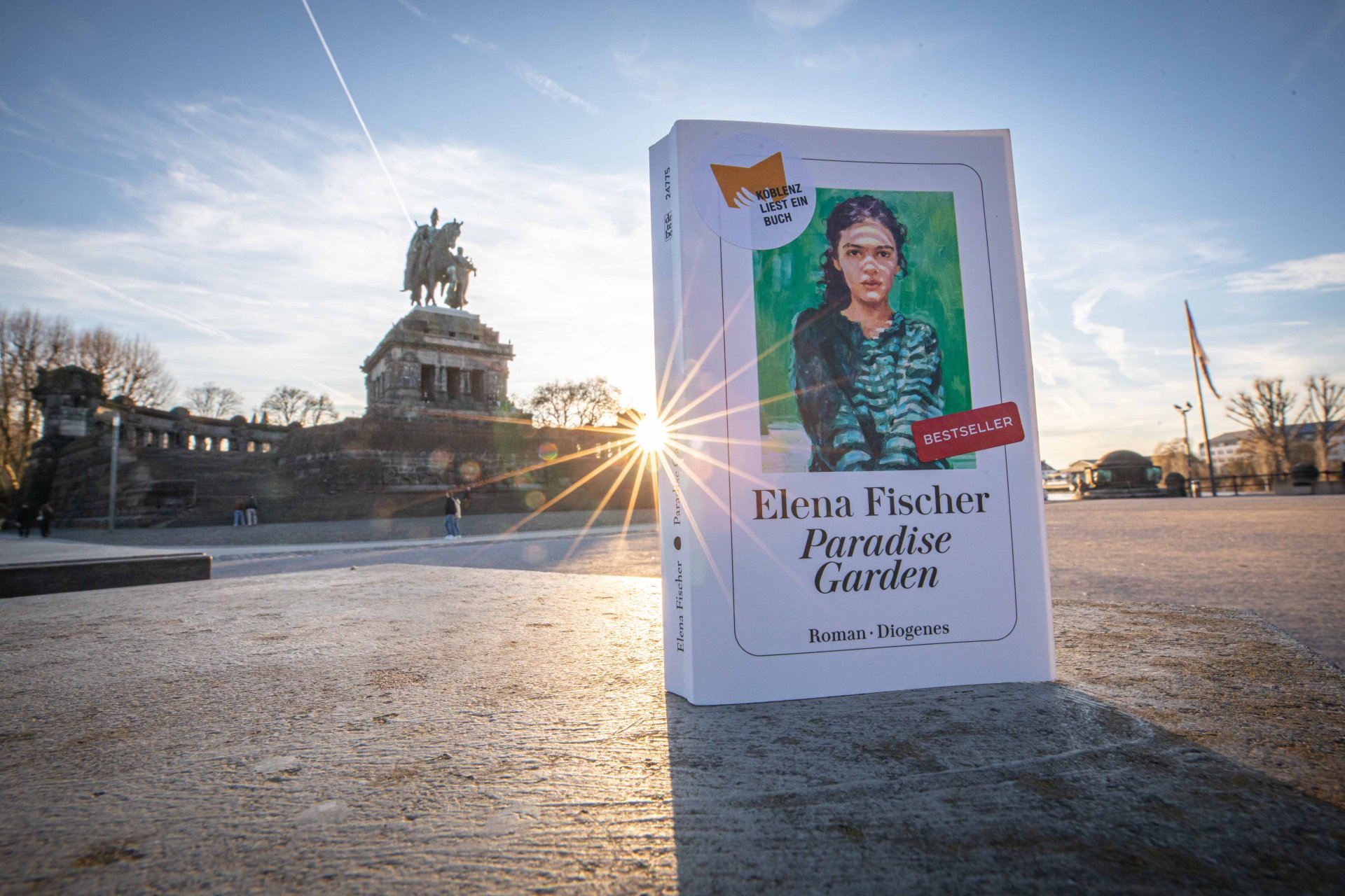 Der Roman „Paradise Garden“ von Elena Fischer ist 2026 das Buch bei "Koblenz liest ein Buch".