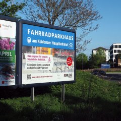 Großflächenplakat Fahrradparkhaus Koblenzer Straße / Kurt-Schumacher-Brücke